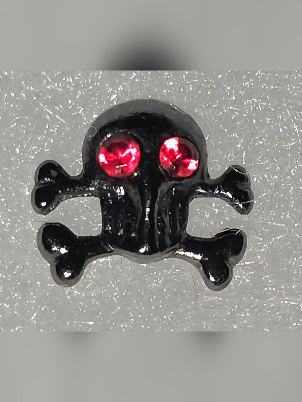 Red Eye Skull Earrings.